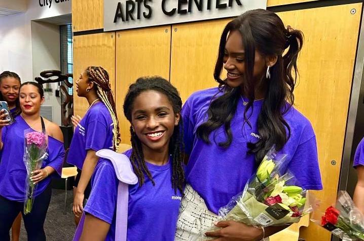 photo of miss kentucky and a student