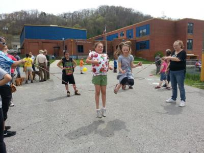 Children jump rope at a Walk Perry County event